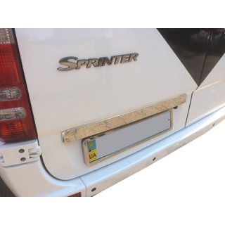 Stainless steel trim above license plate photo 1