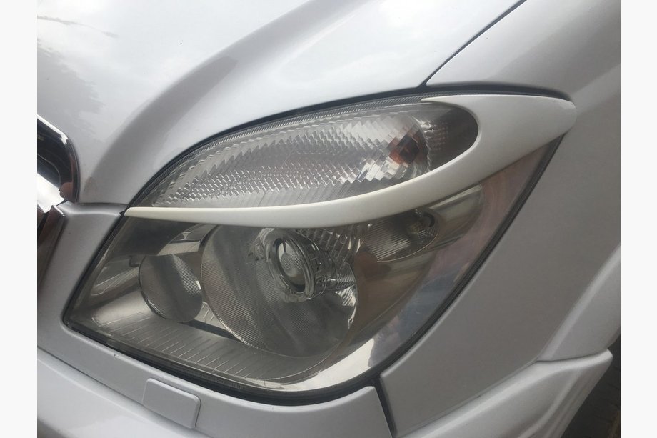 Mercedes Sprinter W906 2006–2018 Headlight Eyelids Moon (primed for painting) Image