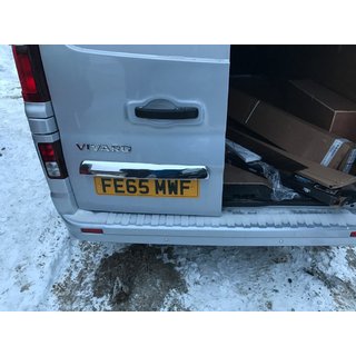 Stainless steel trim above license plate photo 3