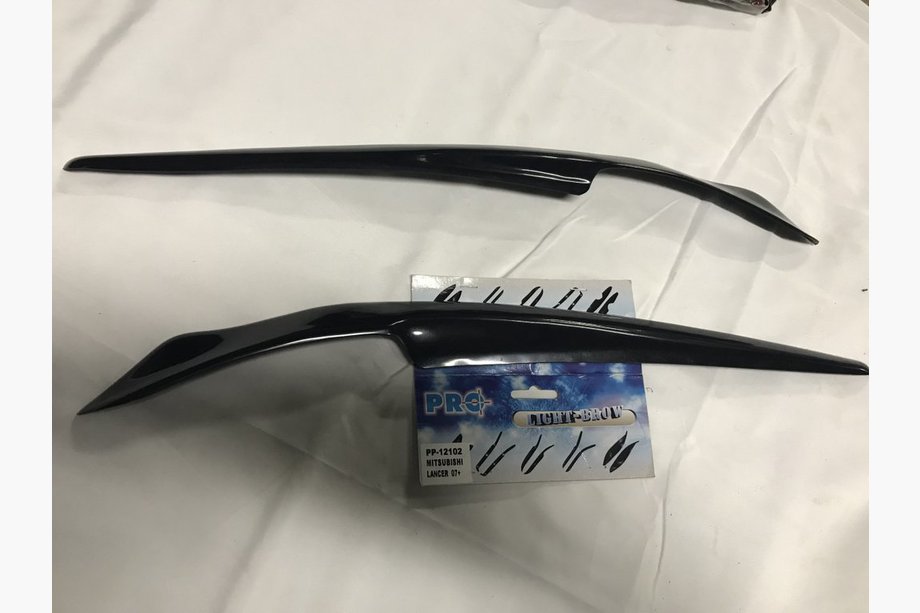 Mitsubishi Lancer X 2008- Headlight Eyelids (2 pcs, primed) Image