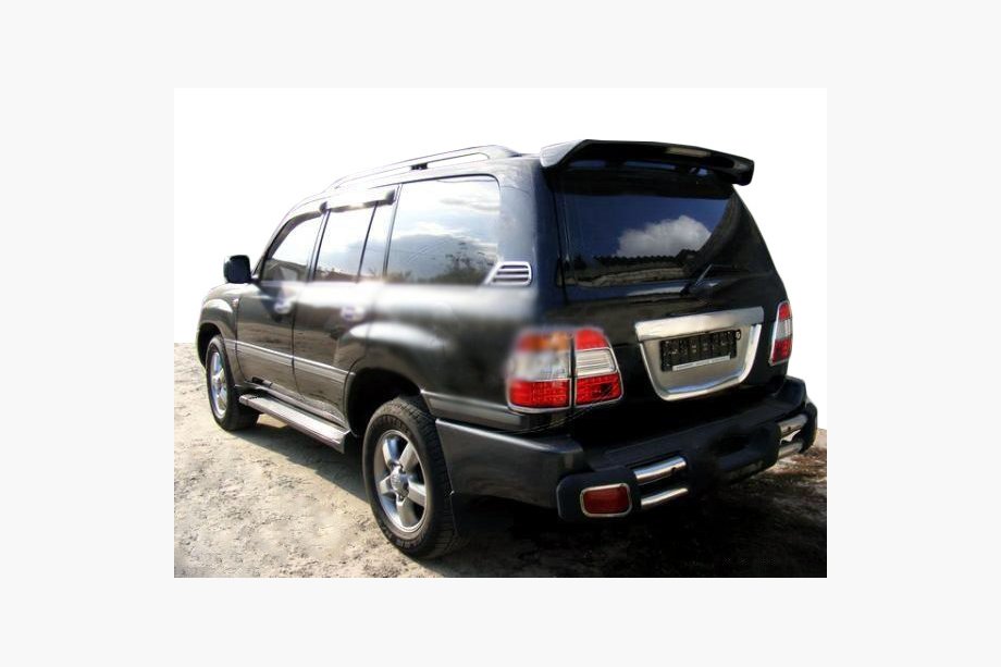 Toyota Land Cruiser 100 1998-2007 Rear chrome trim around license plate (plastic) Image