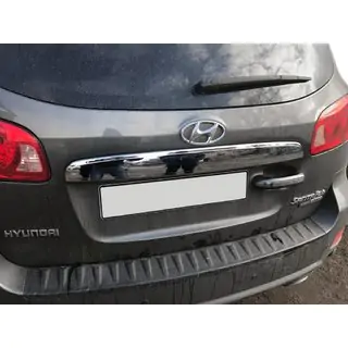 Trunk trim above license plate (stainless steel) photo 1