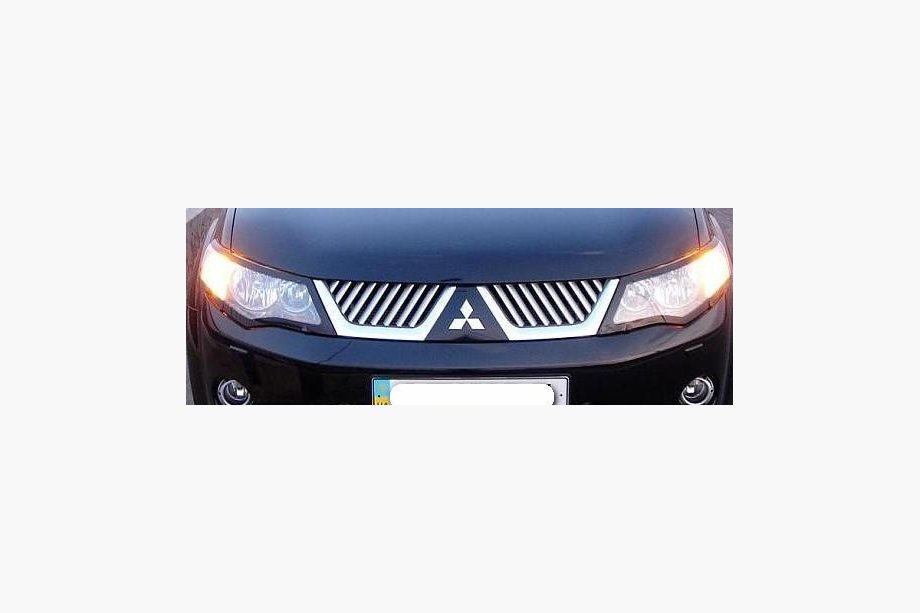 Mitsubishi Outlander 2006-2012 Stainless Steel Grille Covers (2006-2010) Image
