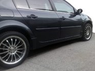 Renault Megane II 2004-2009 Side Skirts (SD, primed for painting) photo 1