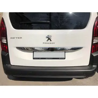 Stainless steel trim above license plate