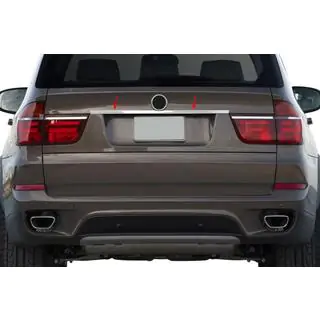 Stainless steel trim above license plate