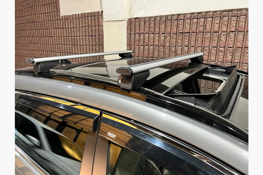 Hyundai Tucson TL 2016-2021 Cross bars for integrated roof rails lockable Wizard V2 (2 pcs) 125cm, black Image