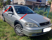 Opel Astra G classic 1998-2012 Fender flares (4 pcs, black metallic) photo 1