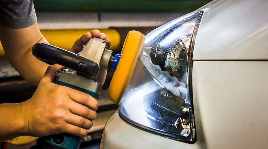 How often should the headlights be polished?
