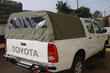 How to close the body of a pickup truck: reliable solutions for cargo protection photo 6