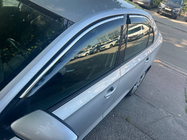 Skoda Rapid 2012-2019 Window Deflectors with Chrome Trim Niken Luxury (4 pcs) photo 1