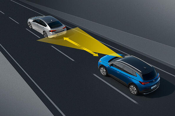 What is adaptive cruise control and how does it work?