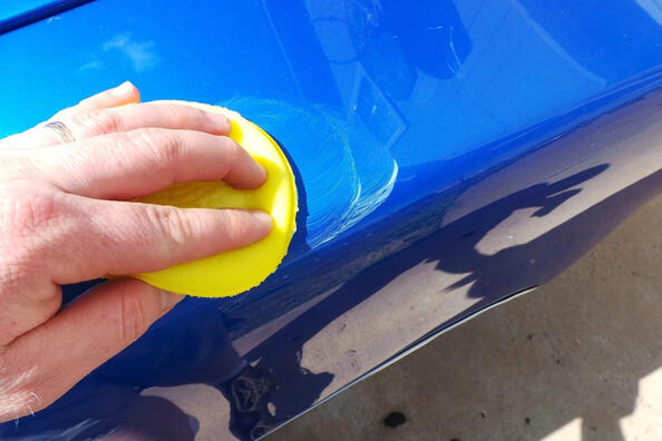 Can I apply regular wax to a wet car?