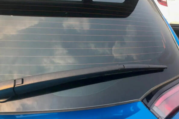 Pros and cons of tinting the rear window of a car