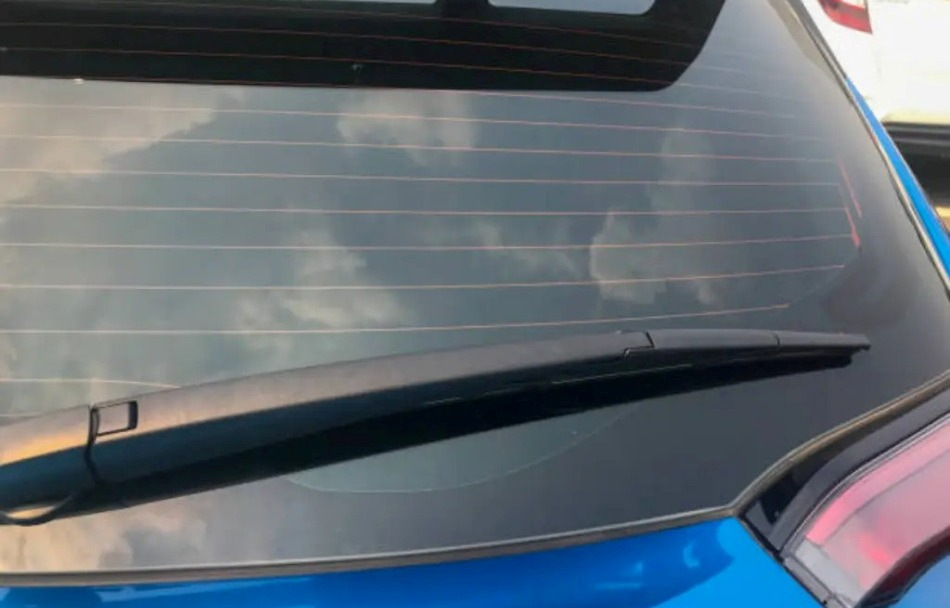 Pros and cons of tinting the rear window of a car
