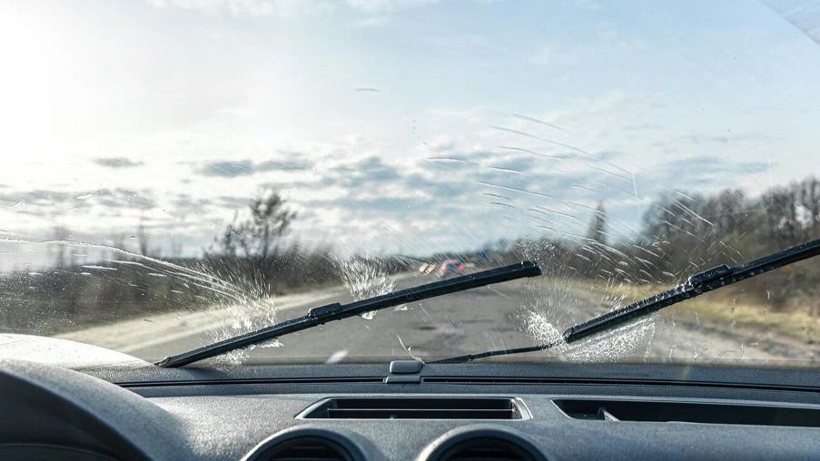 Why do wipers scratch car windows?