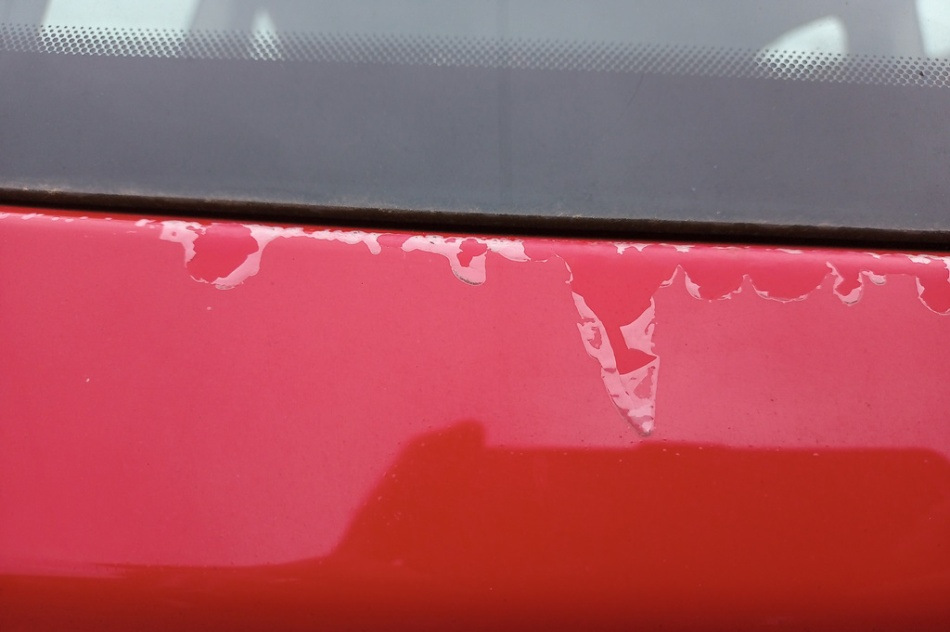 Why does the paint on a car lose its appearance and peel off?