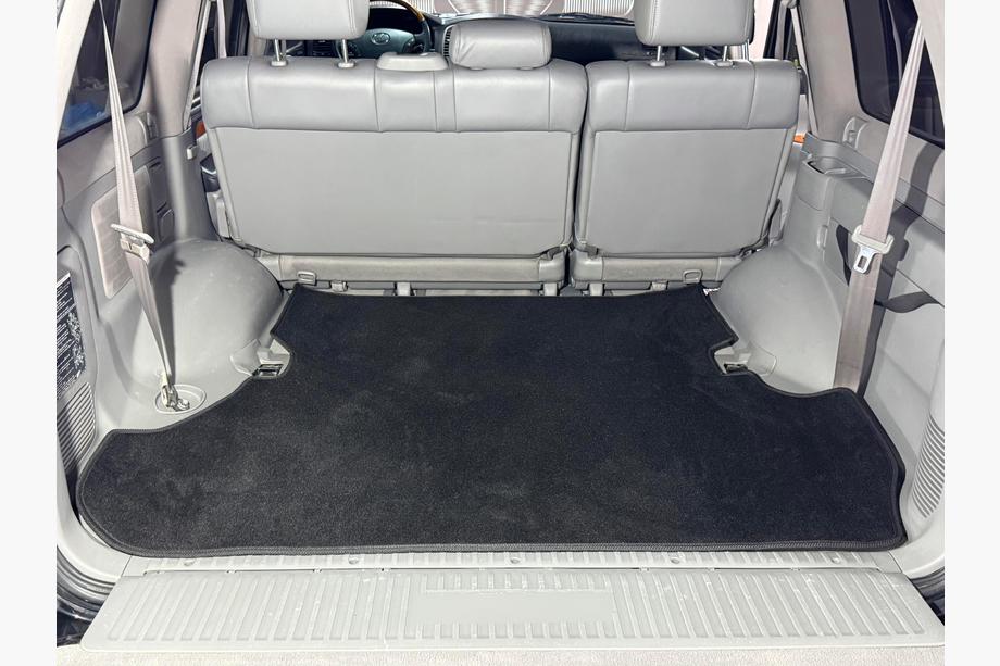 Toyota Land Cruiser 100 1998-2007 Textile Trunk Mat Premium 2 pcs Black (7 seats) Image