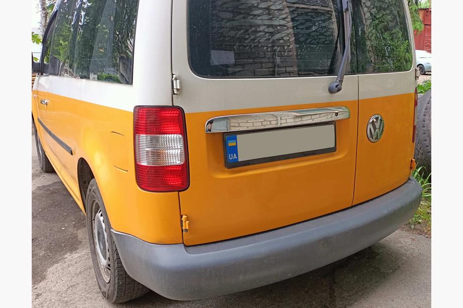 Volkswagen Caddy 2004-2010 Chrome trim above license plate (2-door, stainless steel) Without Inscription, Carmos - Turkish Steel Image