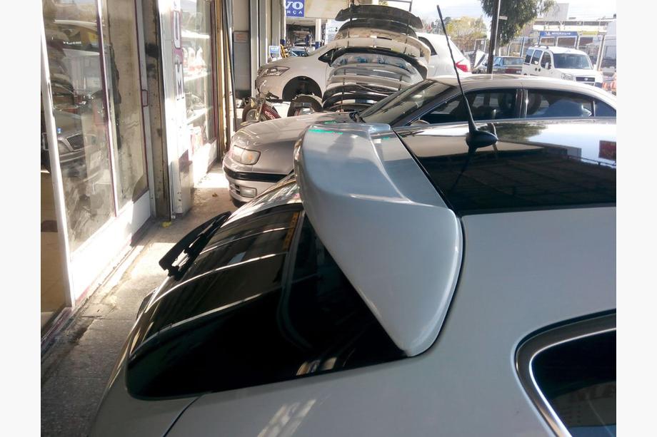 Opel Astra J 2009-2015 HB Spoiler (primed for painting) Image