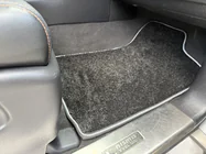 Nissan Armada 2016-2024 Deluxe Textile Floor Mats (3 Rows, Black) photo 3