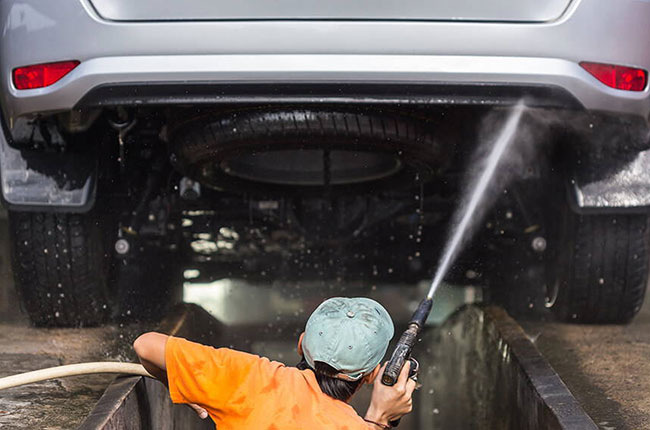 How often should the underbody of a car be washed?