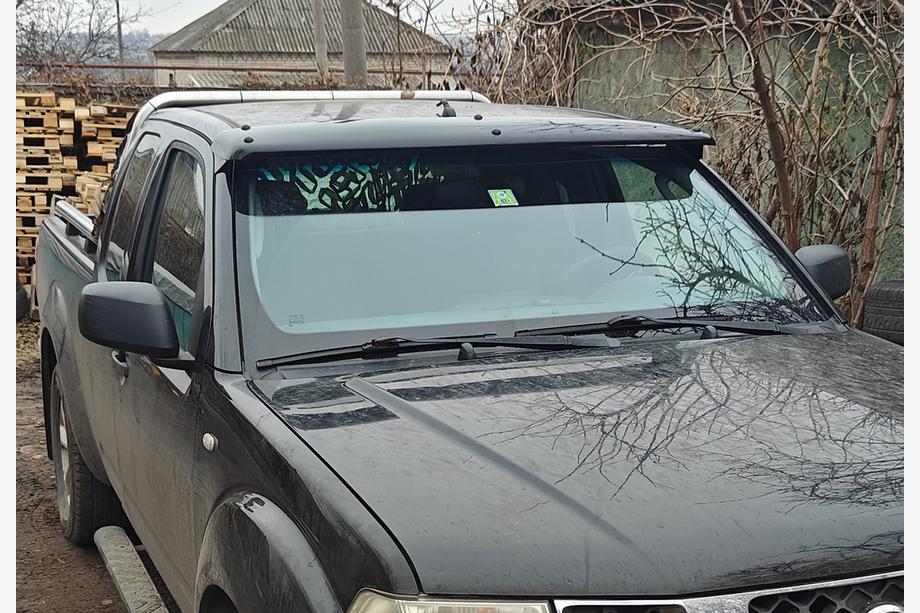 Nissan Navara 2006-2015 Windshield Sun Visor (Frame Mounted) Image