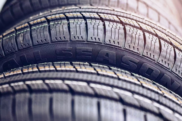 How effective are all-season tires in winter and summer?