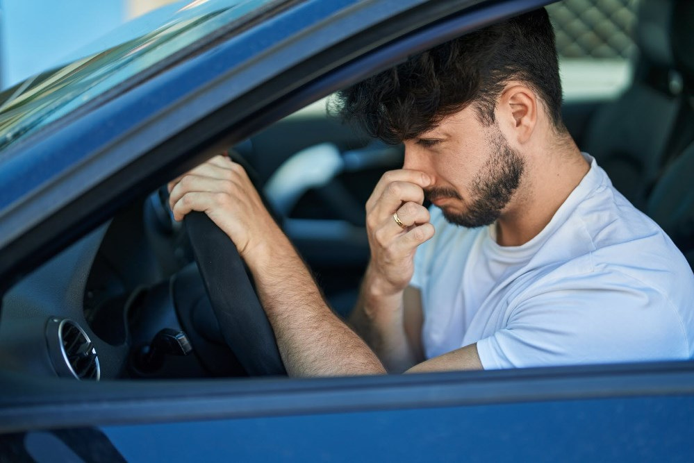Why Does Your Car Smell Like Gasoline? Main Causes and Fixes