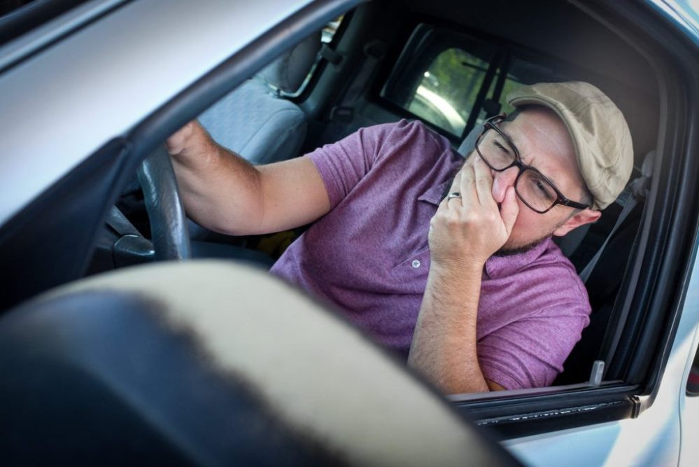Why does my car smell like exhaust fumes?