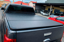 Toyota Hilux 2015- 3-section folding tonneau cover (2020-) photo 1