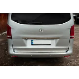 Wide stainless steel tailgate trim above license plate photo 4