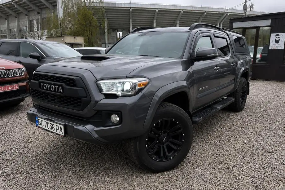 Toyota Tacoma 2015–2023 OEM Black Roof Rails (Aluminum) Image