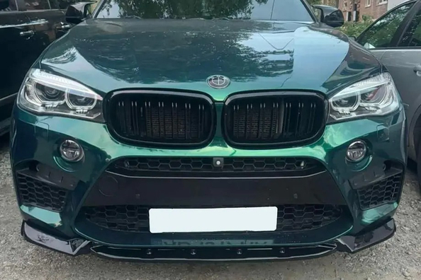 BMW X5 F15 tuning: mirror caps, spoiler and front lip Photo 1