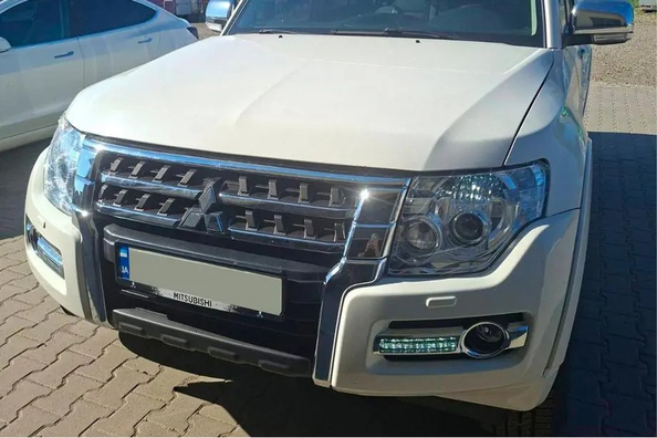 Mitsubishi Pajero Wagon IV facelift: front bumper replacement Photo 8