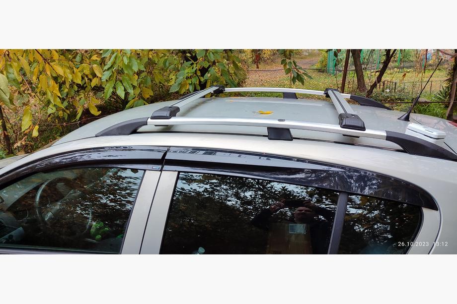 Opel Astra H 2004-2013 Lockable roof rack for standard roof rails (2 pcs) Black Image