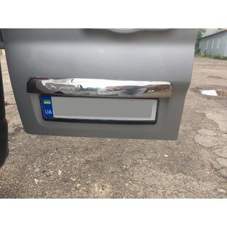 Stainless steel trim above license plate photo 3