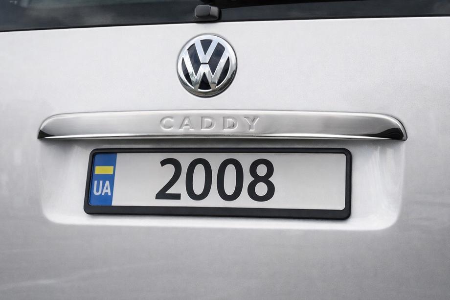 Volkswagen Caddy 2004-2010 Chrome trim above license plate (1-door, stainless steel) Carmos - Turkish Stainless Steel (with inscription) Image