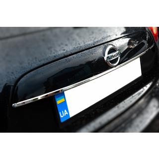 Chrome trim above license plate (stainless steel) photo 2