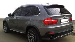 BMW X5 E70 2007-2013 Rear bumper cover (2007-2010, primed for painting) photo 1