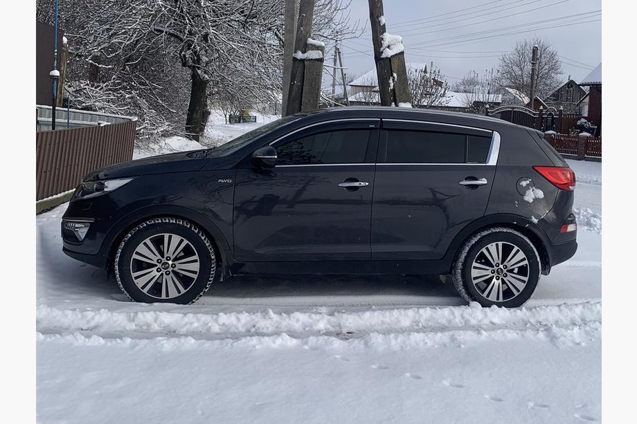Kia Sportage 2010-2015 Window deflectors with chrome trim (4 pcs, Niken) Image