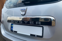 Renault Duster 2008–2017 Upper stainless steel trim above license plate photo 1