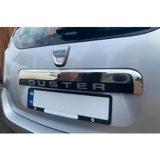 Upper stainless steel trim above license plate photo 1