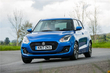 An overview of hatchback Suzuki Swift photo 1