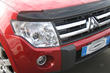 Install the deflector on the hood photo 1