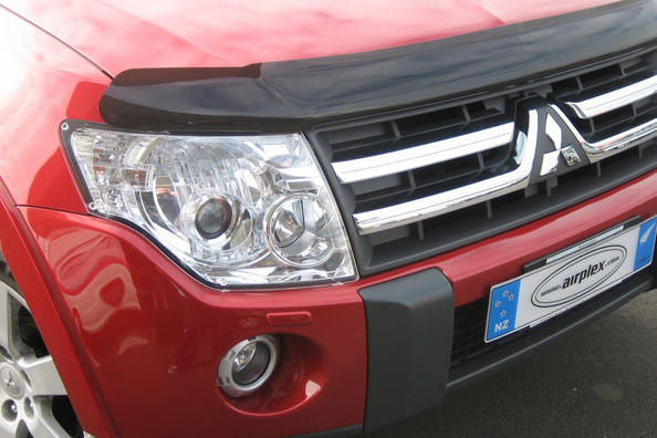 Install the deflector on the hood