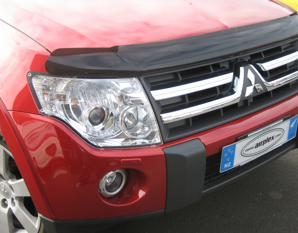 Install the deflector on the hood