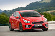 An overview of hatchback KIA Ceed GT photo 1