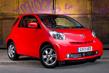 The compact three-door hatchback Toyota iQ photo 1