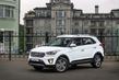 Review the crossover Hyundai Grand photo 2